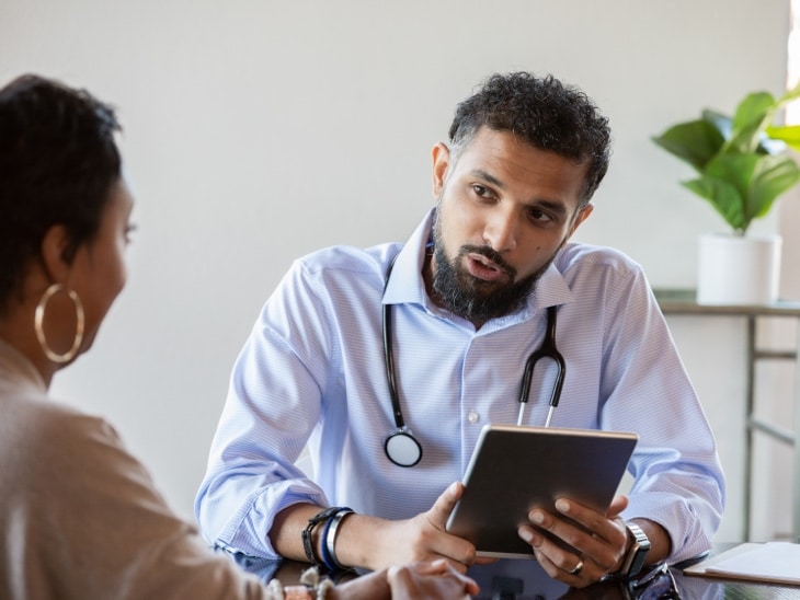 Doctor And Patient In Meeting